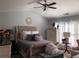 Charming bedroom features vaulted ceilings, a ceiling fan, and two windows at 3692 Ramsey Cir, Atlanta, GA 30331