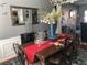 Inviting dining room featuring a hardwood table, stylish decor, and a serene ambiance at 3692 Ramsey Cir, Atlanta, GA 30331