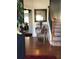Inviting foyer with hardwood floors, staircase, and decorative accents at 3692 Ramsey Cir, Atlanta, GA 30331