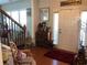 Inviting foyer with hardwood floors, staircase, and decorative accents at 3692 Ramsey Cir, Atlanta, GA 30331