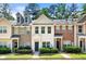 Charming townhouse with neat landscaping and inviting front entrance at 420 Berckman Nw Dr, Lilburn, GA 30047