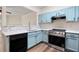 Updated kitchen with light-colored countertops and stainless steel appliances at 420 Berckman Nw Dr, Lilburn, GA 30047
