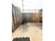 Small backyard area with weathered fence and concrete patio at 602 Summer Pl, Norcross, GA 30071