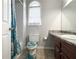 Bathroom with tub and shower and decorative blue turtle themed accessories at 602 Summer Pl, Norcross, GA 30071