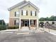 Two-story building with parking in front and a brick and siding exterior at 602 Summer Pl, Norcross, GA 30071