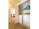 A laundry closet contains a washer and dryer, with open door to bedroom at 602 Summer Pl, Norcross, GA 30071