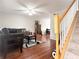 Comfortable living room with hardwood floors and staircase leading to the upper level at 602 Summer Pl, Norcross, GA 30071