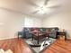 Cozy living room with a large sofa and decorative area rug at 602 Summer Pl, Norcross, GA 30071