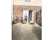 Outdoor patio with a bike parked by the door at 602 Summer Pl, Norcross, GA 30071