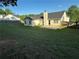 Large backyard with an exterior view of the home at 929 Wexford Way, Auburn, GA 30011