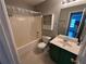 Bathroom with vanity, tub, shower, and a toilet at 929 Wexford Way, Auburn, GA 30011