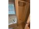 Bathroom featuring a separate tub and shower with a large window that provides natural light at 929 Wexford Way, Auburn, GA 30011