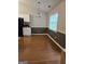 Dining area featuring wooden flooring and a view of the outdoors at 929 Wexford Way, Auburn, GA 30011