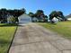 Exterior of a charming house with a long driveway at 929 Wexford Way, Auburn, GA 30011