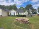 Charming home with a well-maintained front lawn and a fenced backyard, offering privacy at 929 Wexford Way, Auburn, GA 30011