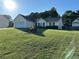 Lovely house featuring a spacious front lawn at 929 Wexford Way, Auburn, GA 30011