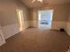 Expansive main bedroom provides ample space and access to a connecting ensuite at 929 Wexford Way, Auburn, GA 30011