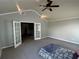 Spacious main bedroom features vaulted ceiling, ceiling fan and connecting ensuite at 929 Wexford Way, Auburn, GA 30011