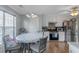 Kitchen breakfast nook with natural light, ceiling fan, and access to stainless steel appliances at 147 Midland Dr, Stockbridge, GA 30281