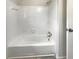 Bathroom featuring a white tub with white tile surround at 1710 Fontaine Dr, Jonesboro, GA 30236