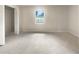 Bedroom showcasing a carpeted floor, a closet, neutral paint, and a window at 1710 Fontaine Dr, Jonesboro, GA 30236