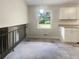Bright kitchen dining area featuring white cabinets, natural light and tile floors at 1710 Fontaine Dr, Jonesboro, GA 30236