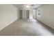 Large bedroom with carpet, natural light and two closets, offering ample storage space at 1710 Fontaine Dr, Jonesboro, GA 30236