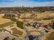 Aerial view of Bobby Jones Golf Course and Clubhouse highlighting the putting green and surrounding forest at 1764 Defoor Nw Ave, Atlanta, GA 30318