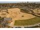 Aerial view of Bobby Jones Golf Course driving range and putting green and clubhouse with a brick exterior at 1764 Defoor Nw Ave, Atlanta, GA 30318