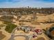 Aerial view of the Atlanta skyline in the distance with a beautiful golf course at 1764 Defoor Nw Ave, Atlanta, GA 30318