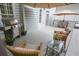 Outdoor deck with stainless steel grill, wicker chairs, and umbrella, perfect for al fresco dining and relaxation at 1764 Defoor Nw Ave, Atlanta, GA 30318
