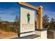 Bobby Jones Golf Course sign shows an illustration of Bobby Jones with a green outfit and golf club at 1764 Defoor Nw Ave, Atlanta, GA 30318