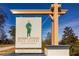 Bobby Jones Golf Course sign shows an illustration of Bobby Jones with a tan colored structural post at 1764 Defoor Nw Ave, Atlanta, GA 30318