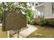Historical marker in front of home, near walkway to covered porch and front door at 1764 Defoor Nw Ave, Atlanta, GA 30318