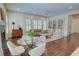 Spacious living area featuring hardwood floors, a fireplace, and ample seating at 1764 Defoor Nw Ave, Atlanta, GA 30318