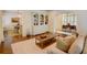 Spacious living room with hardwood floors, built-in shelving, and an open archway for seamless entertaining at 1764 Defoor Nw Ave, Atlanta, GA 30318