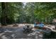 A great community playground area with picnic tables, swings, and various play equipment for all ages at 1764 Defoor Nw Ave, Atlanta, GA 30318
