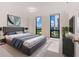 Bedroom features neutral colors, hardwood floors, large windows and great natural light at 2870 Pharr Court South Nw # 1405, Atlanta, GA 30305