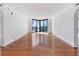 Spacious living room featuring hardwood floors and floor to ceiling windows at 2870 Pharr Court South Nw # 1405, Atlanta, GA 30305