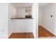 Bright room with hardwood floors and granite bar to kitchen at 2870 Pharr Court South Nw # 1405, Atlanta, GA 30305