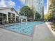 Outdoor pool with lounge chairs, with building in the background at 2870 Pharr Court South Nw # 1405, Atlanta, GA 30305