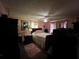 Comfortable bedroom with soft lighting, carpet and a ceiling fan at 3143 Cedar St, Scottdale, GA 30079