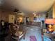 Cozy living room with ample seating, ceiling fan, and natural light at 3143 Cedar St, Scottdale, GA 30079