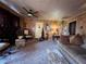 Well-lit living room featuring cozy furniture, vintage decor, and a ceiling fan at 3143 Cedar St, Scottdale, GA 30079