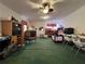 Spacious bonus room with ample area for varied activities and comfortable green carpeting at 3143 Cedar St, Scottdale, GA 30079