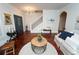Inviting foyer with hardwood floors, staircase, and a stylish entryway at 550 Quillian Ave, Decatur, GA 30032