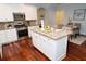 Well-appointed kitchen with granite countertops, stainless steel appliances, and a center island at 550 Quillian Ave, Decatur, GA 30032