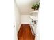 This pantry features dark wood flooring and white metal racks, providing ample storage space at 550 Quillian Ave, Decatur, GA 30032