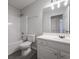 A bright white full bath features vanity storage, shower and tub, and tiled flooring at 5937 Yellowood Ct, Atlanta, GA 30349