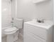 A bright white full bath has a tiled shower/tub and vanity at 5937 Yellowood Ct, Atlanta, GA 30349